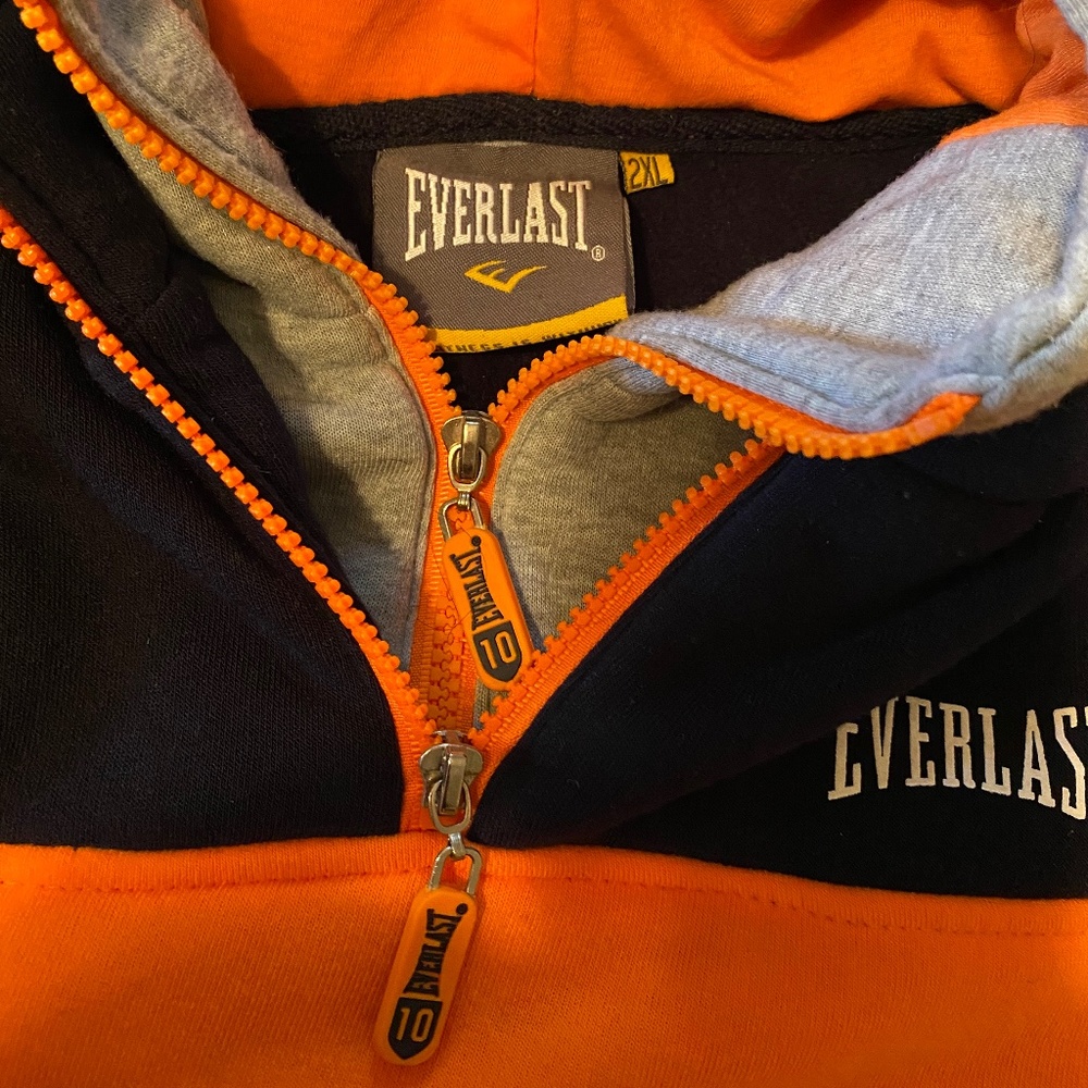 Bright, fun, Double hood orange grey navy sweatshirt NWOT